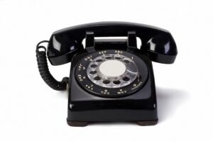 A black rotary phone